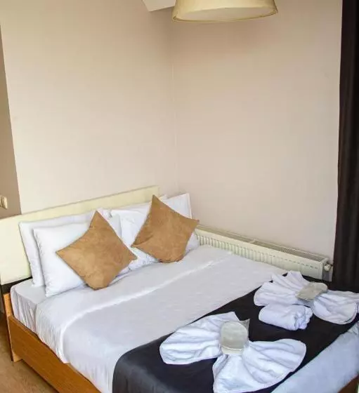 Three Apples Suites And