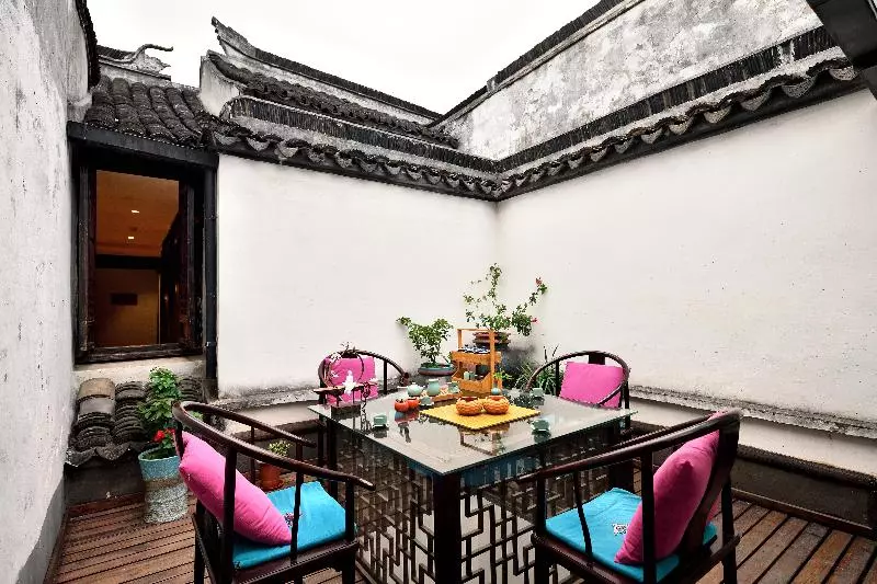 ホテル Blossom Hill Inn Zhouzhuang Seasonland