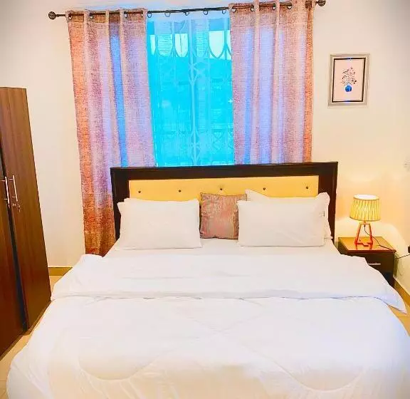 ホテル Aiden Homes And Apartments