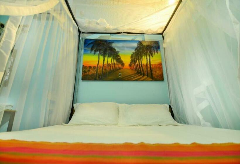 酒店 Palm Leaf Surf Cafe