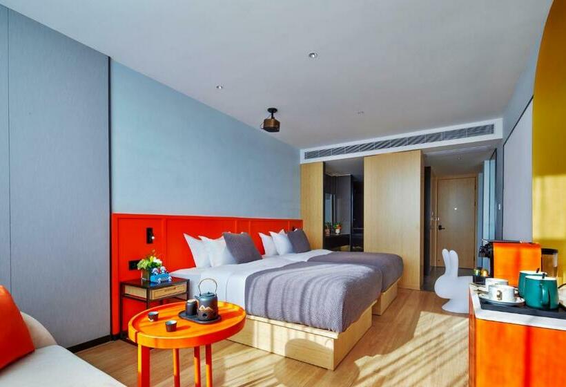 בית מלון כפרי Global Village Riverside