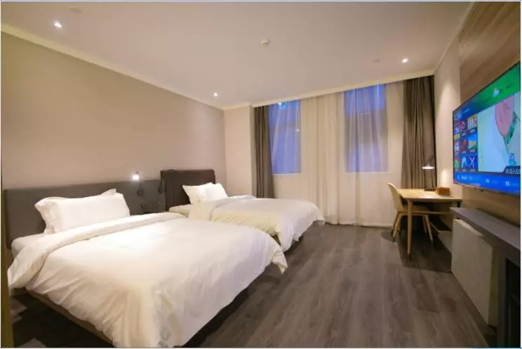 Отель Hanting Premium Zhenjiang Dashikou