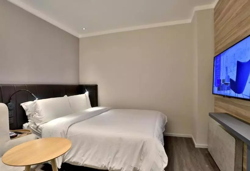 Отель Hanting Premium Zhenjiang Dashikou