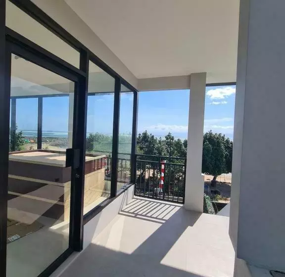 ホテル Merpati Inn