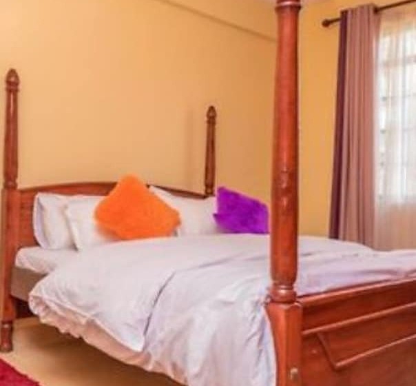 هتل Karibu Airport Homestay