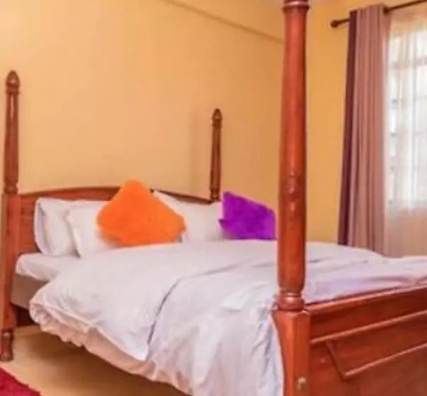 هتل Karibu Airport Homestay