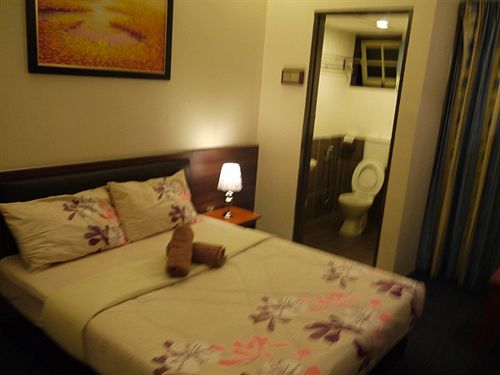 Отель Camellia Budget Inn