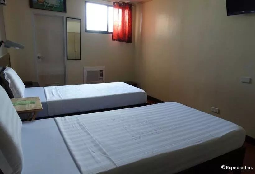 ホテル Ruemango Apartelle And Suites