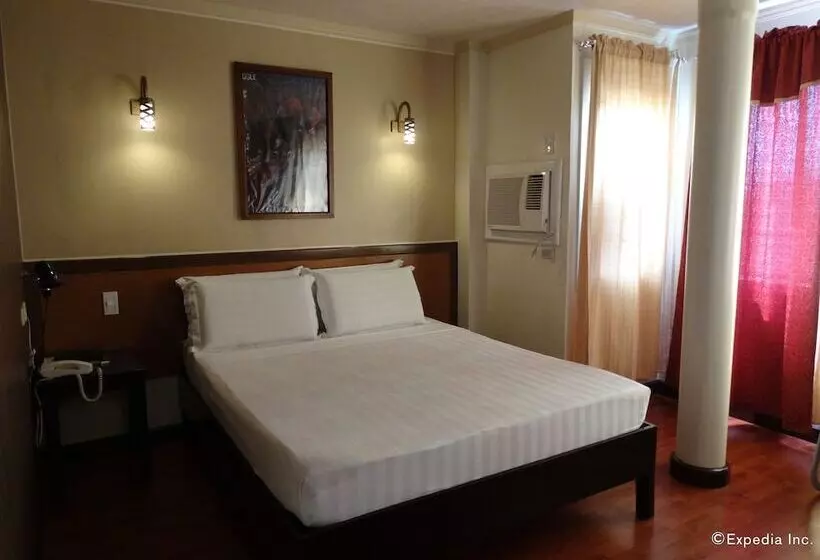 ホテル Ruemango Apartelle And Suites