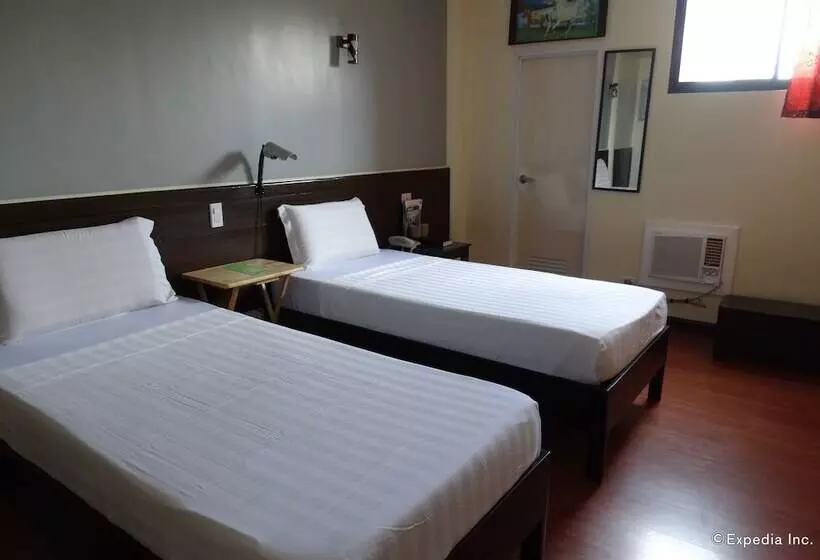 ホテル Ruemango Apartelle And Suites