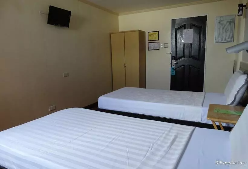 ホテル Ruemango Apartelle And Suites