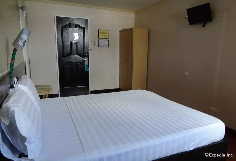 ホテル Ruemango Apartelle And Suites