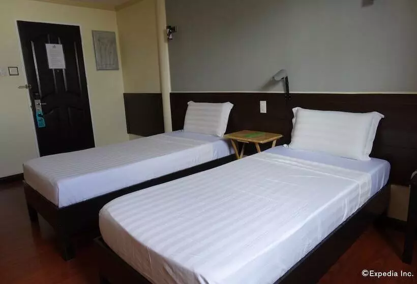 ホテル Ruemango Apartelle And Suites