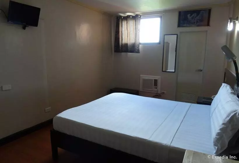 ホテル Ruemango Apartelle And Suites