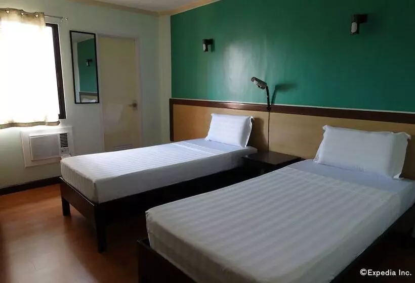 ホテル Ruemango Apartelle And Suites