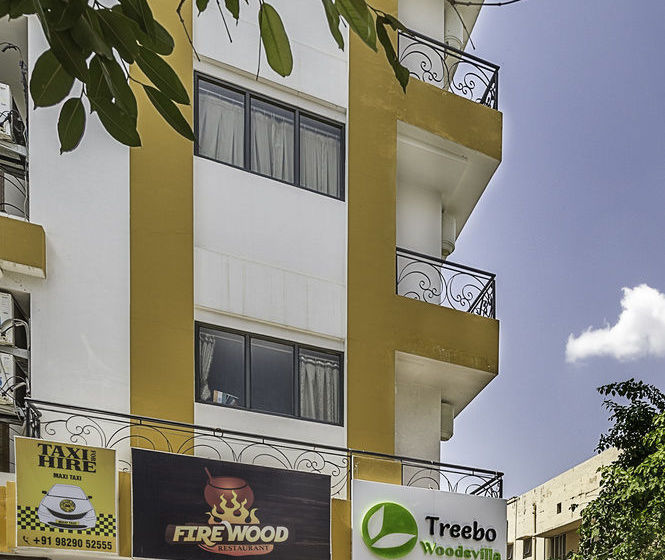 בית מלון כפרי Treebo Trend Woodsvilla Suites