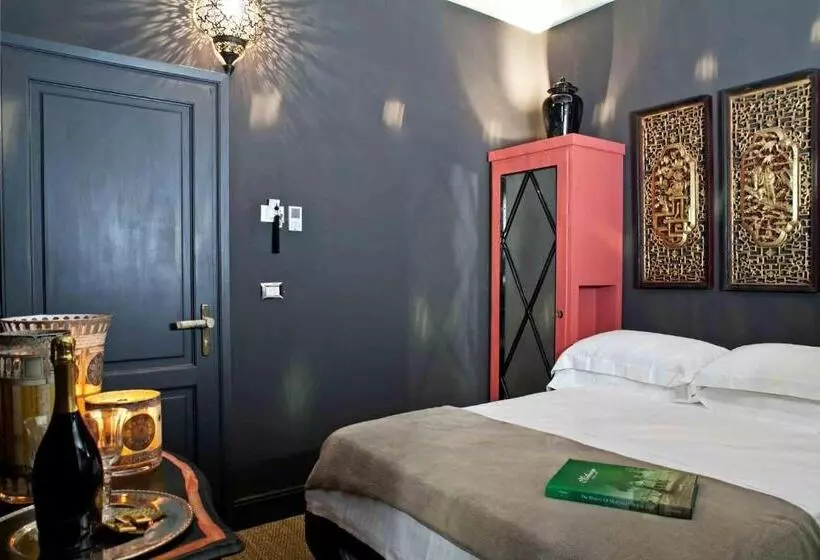 تختخواب و صبحانه Porcellino Gallery Art Boutique Bb