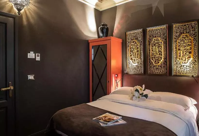 تختخواب و صبحانه Porcellino Gallery Art Boutique Bb