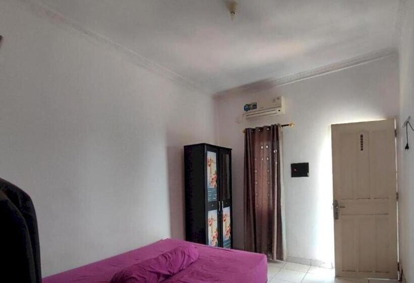 호텔 Oyo 93252 Garuda Bandara Guesthouse