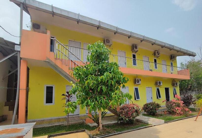 호텔 Oyo 93252 Garuda Bandara Guesthouse