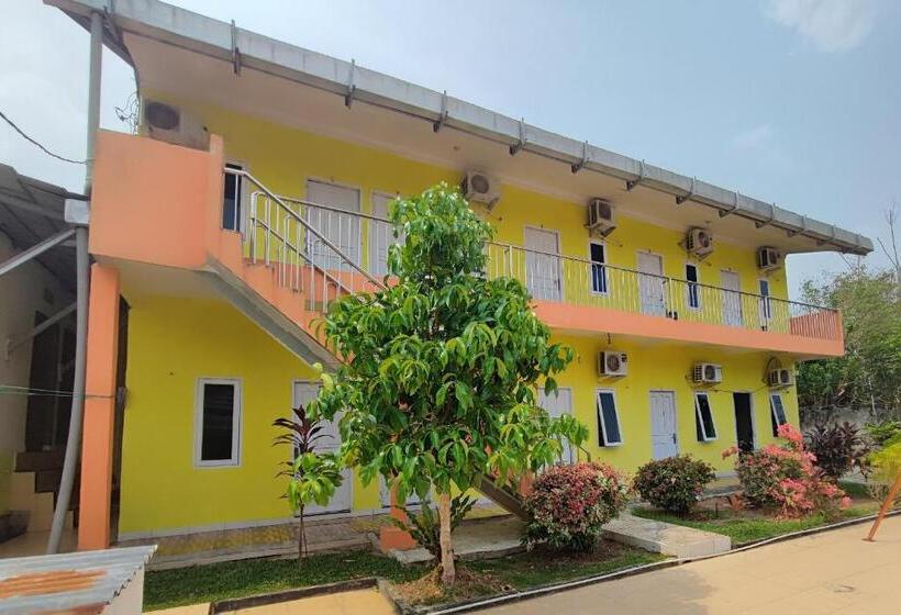 호텔 Oyo 93252 Garuda Bandara Guesthouse