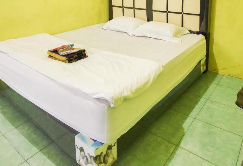 בית מלון כפרי Reddoorz Near Pelabuhan Ajibata Parapat