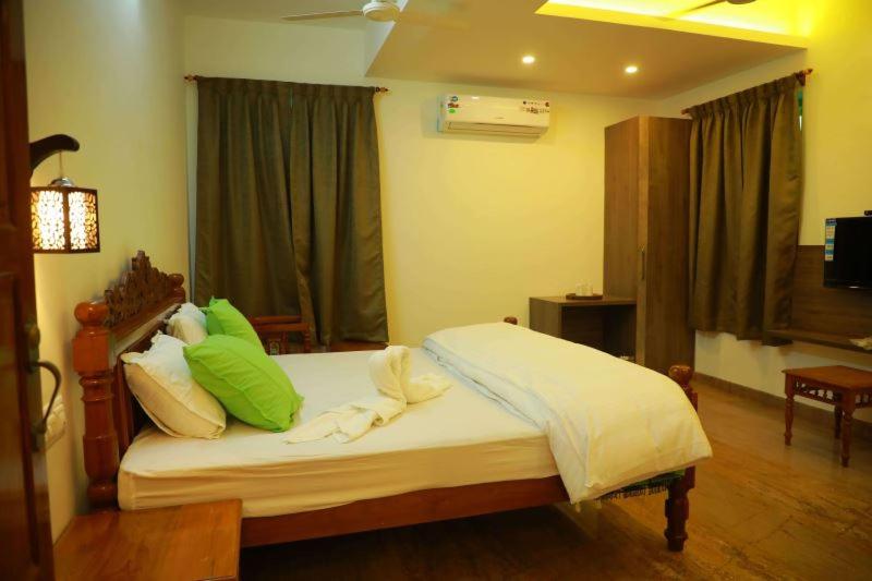 펜션 Thiraviam Tourist Home Kanniyakumari