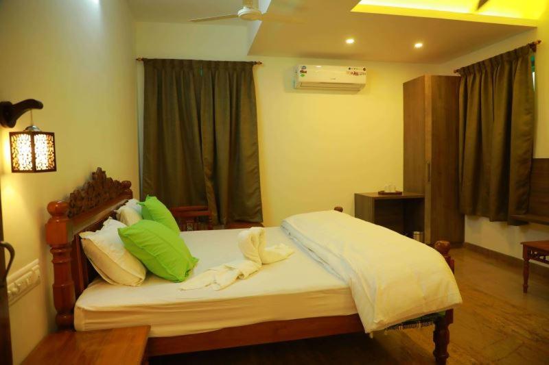 펜션 Thiraviam Tourist Home Kanniyakumari