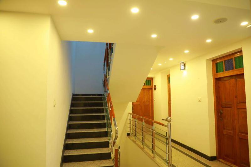 펜션 Thiraviam Tourist Home Kanniyakumari