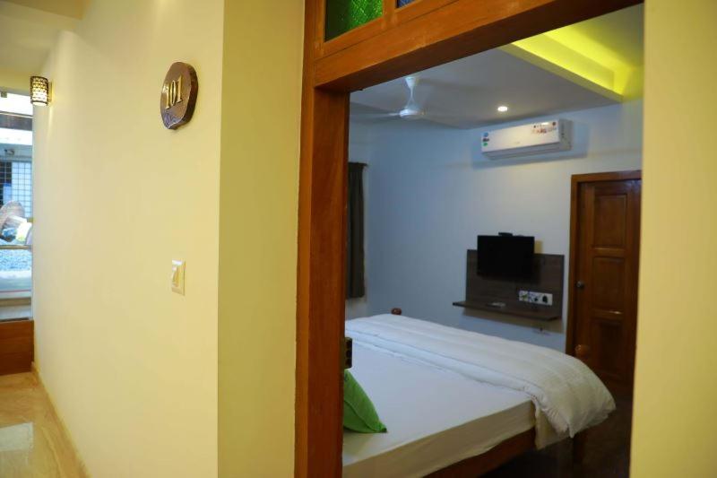 펜션 Thiraviam Tourist Home Kanniyakumari