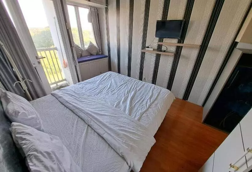 ホテル Oyo Life 93106 Apartement Grand Sentraland By Andi