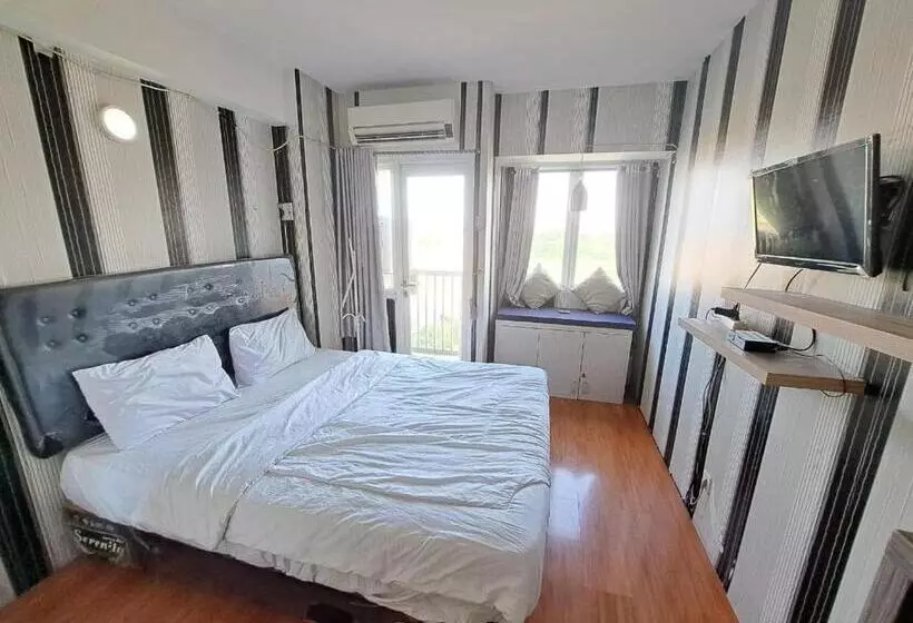 ホテル Oyo Life 93106 Apartement Grand Sentraland By Andi