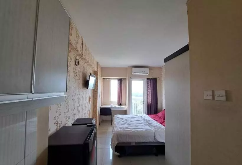 ホテル Oyo Life 93106 Apartement Grand Sentraland By Andi