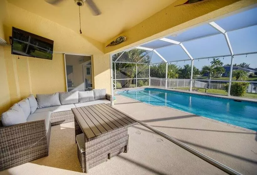 Dock & Fenced Yard: Canal Front Cape Coral Home!