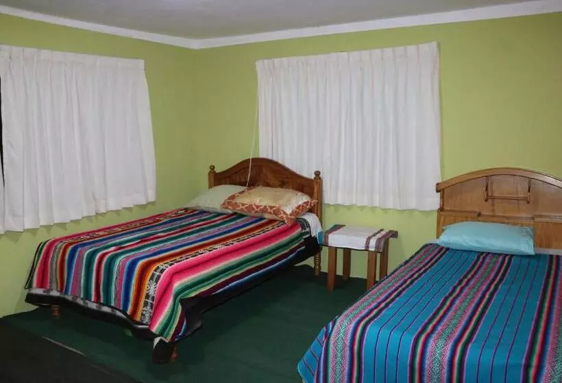 تختخواب و صبحانه Sunset Lodge Amantani