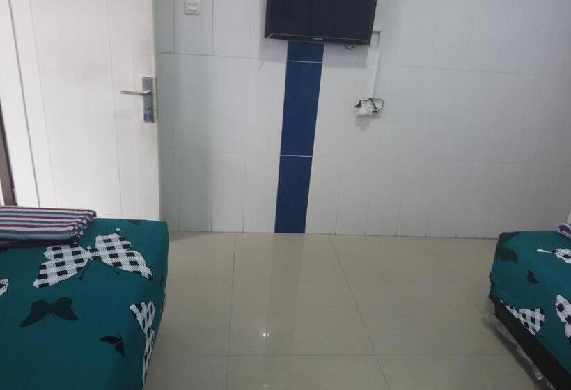 בית מלון כפרי Orchid Syariah