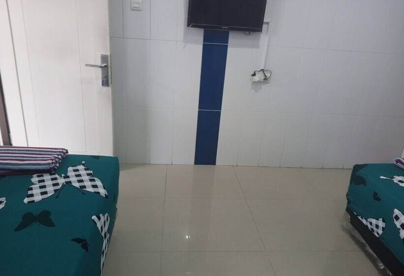 בית מלון כפרי Orchid Syariah