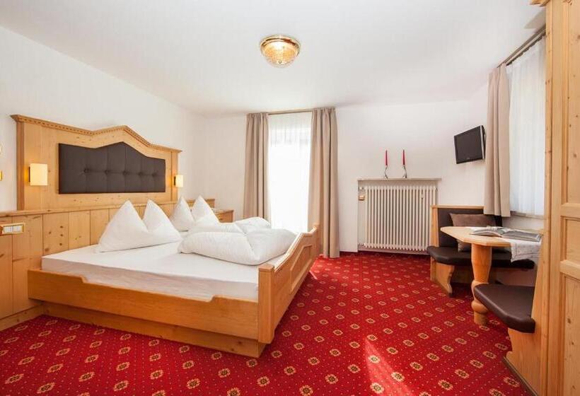 تختخواب و صبحانه Garni Petra