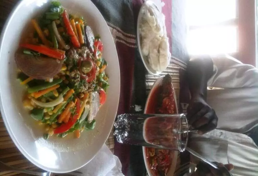 هتل Assouka Eco Village Du Lac Nokoué