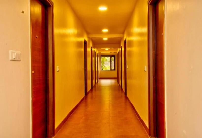 Hotel Goroomgo Palm Apartment Bhimtal