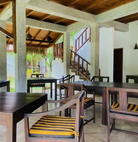 Отель Sanjis The Seaside Cabanas