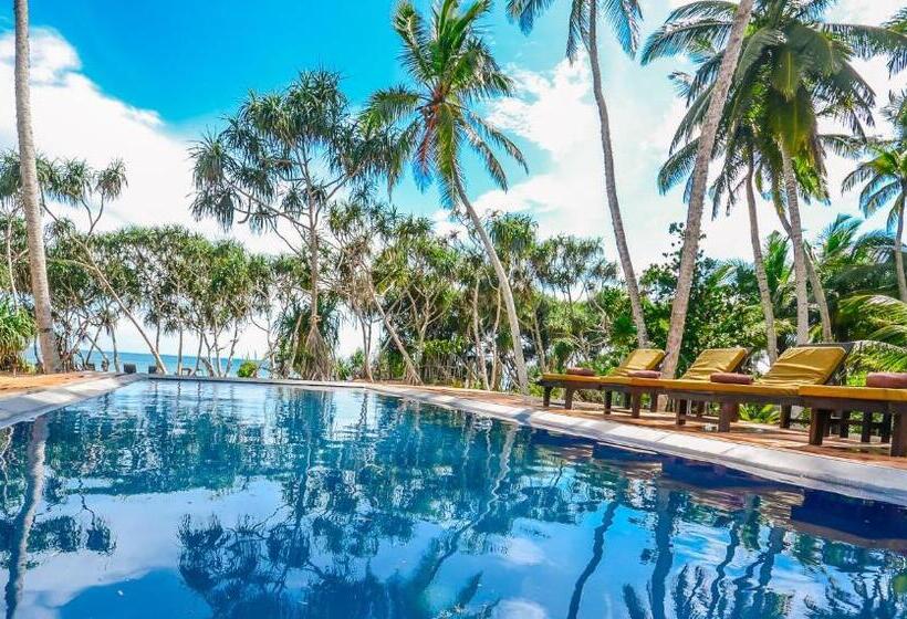 Отель Sanjis The Seaside Cabanas