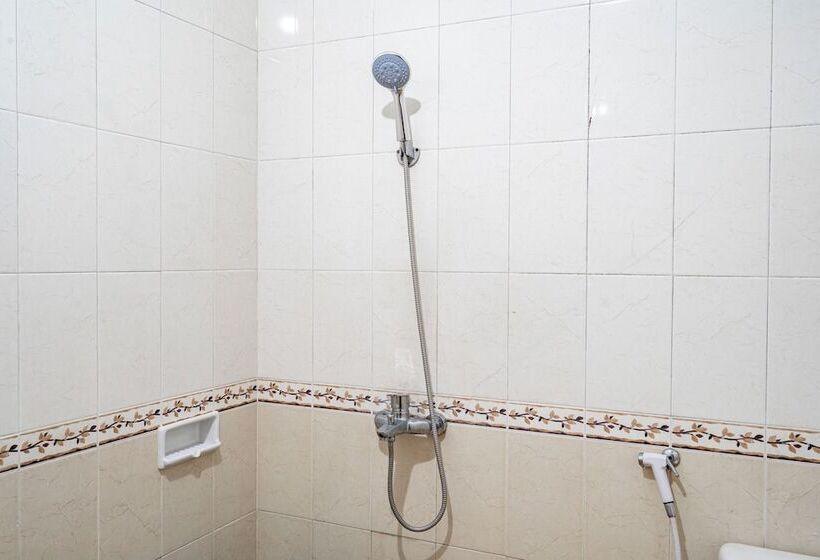 Capital O Hotel Abadi