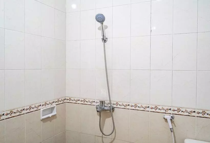 Capital O Hotel Abadi