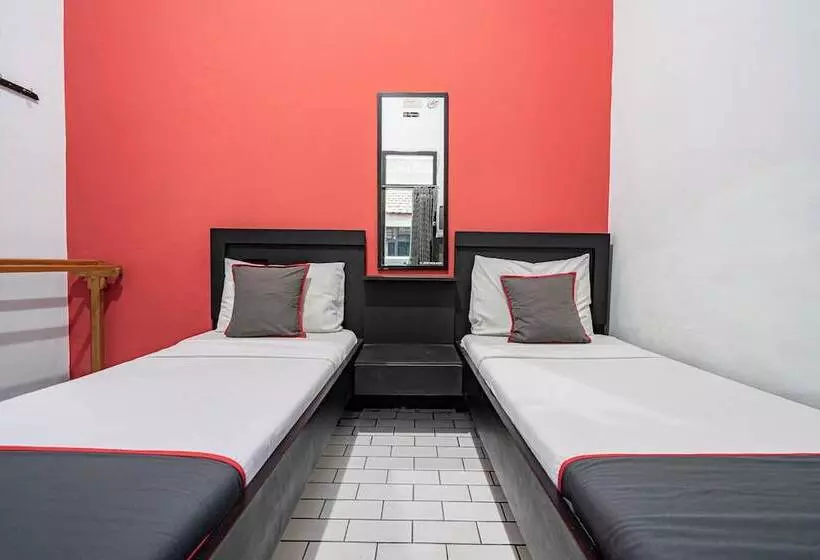 Capital O Hotel Abadi