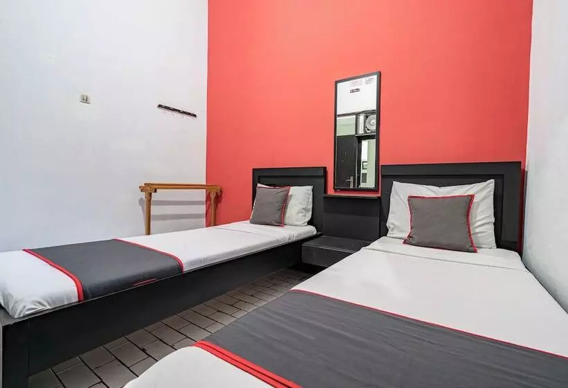 Capital O Hotel Abadi