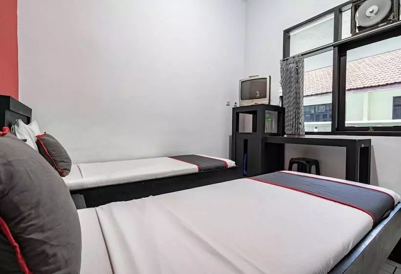 Capital O Hotel Abadi