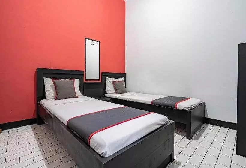 Capital O Hotel Abadi