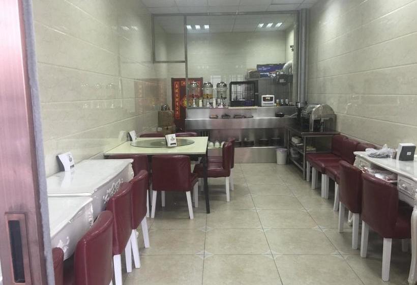 هتل Da Lian Xin Ao Business Inn