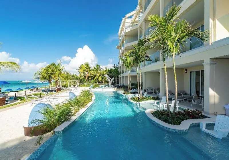 هتل Beachfront At Windsong On The Reef